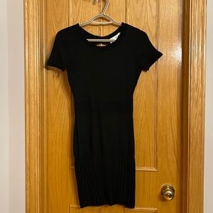 Black short sleeve mini dress with ruffled bottom